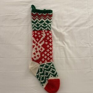 Knitted Christmas stocking red green and white with reindeer lined inside